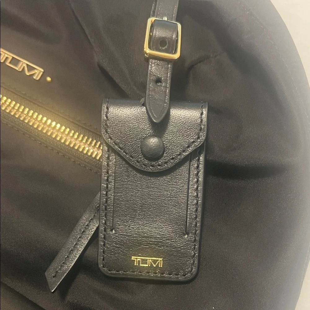 Tumi Halle Black Backpack with Gold Accents
